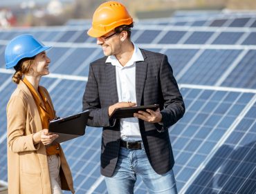 Business people on a solar power station